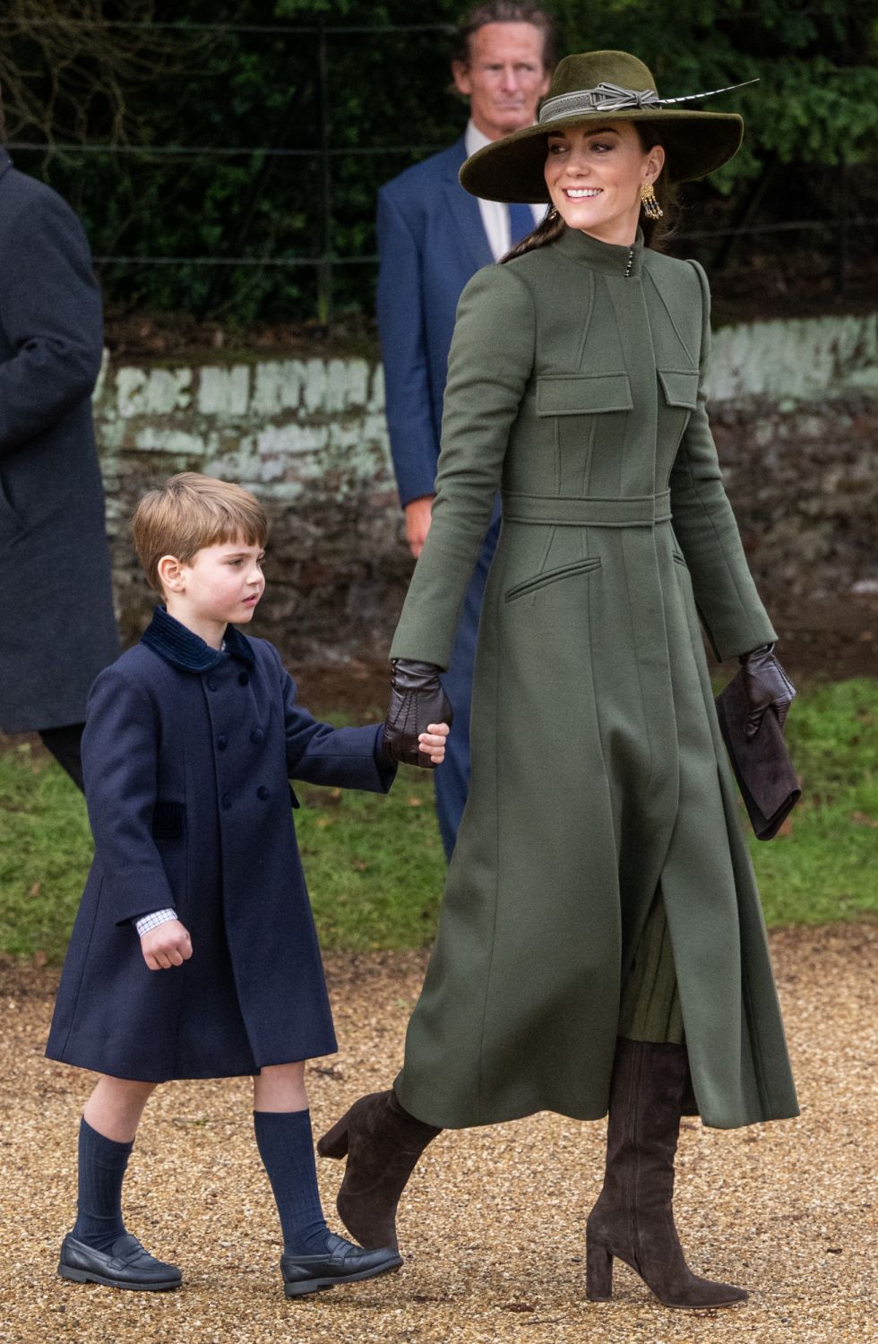SANDRINGHAM, NORFOLK - DECEMBER 25: Prince Louis and Catherine, Princess of Wales attend the Christmas Day service at Sandringham Church on December 25, 2022 in Sandringham, Norfolk. King Charles III ascended to the throne on September 8, 2022, with his coronation set for May 6, 2023. (Photo by Samir Hussein/WireImage)