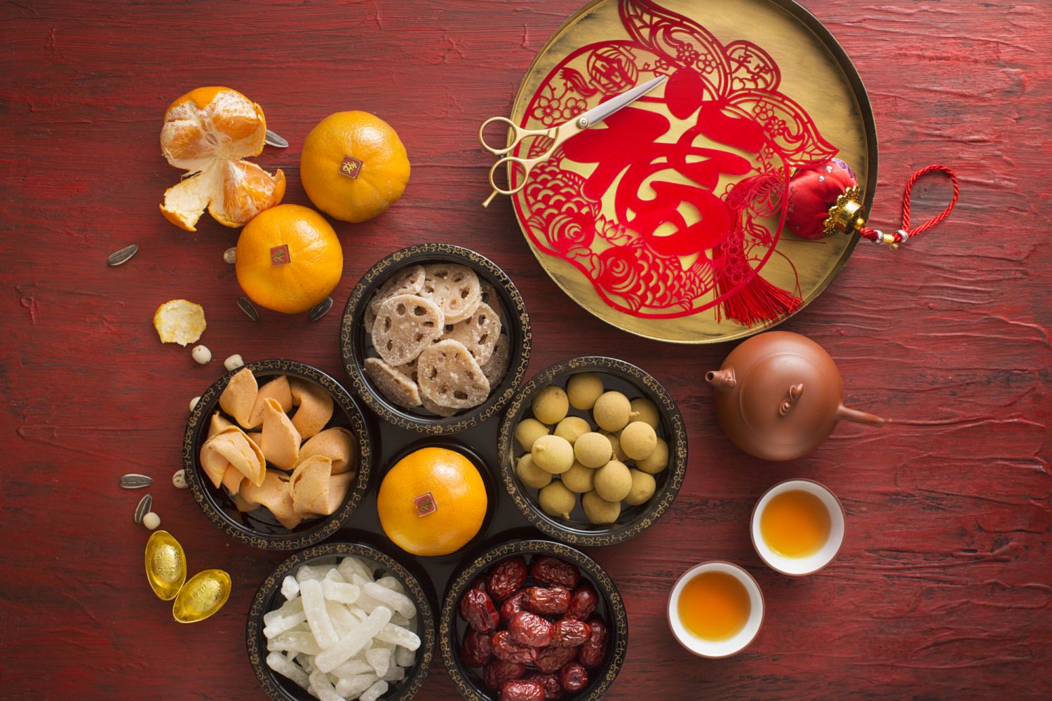 Flat lay Chinese new year food and drink still life. Texts appear in image: Prosperity & Spring.