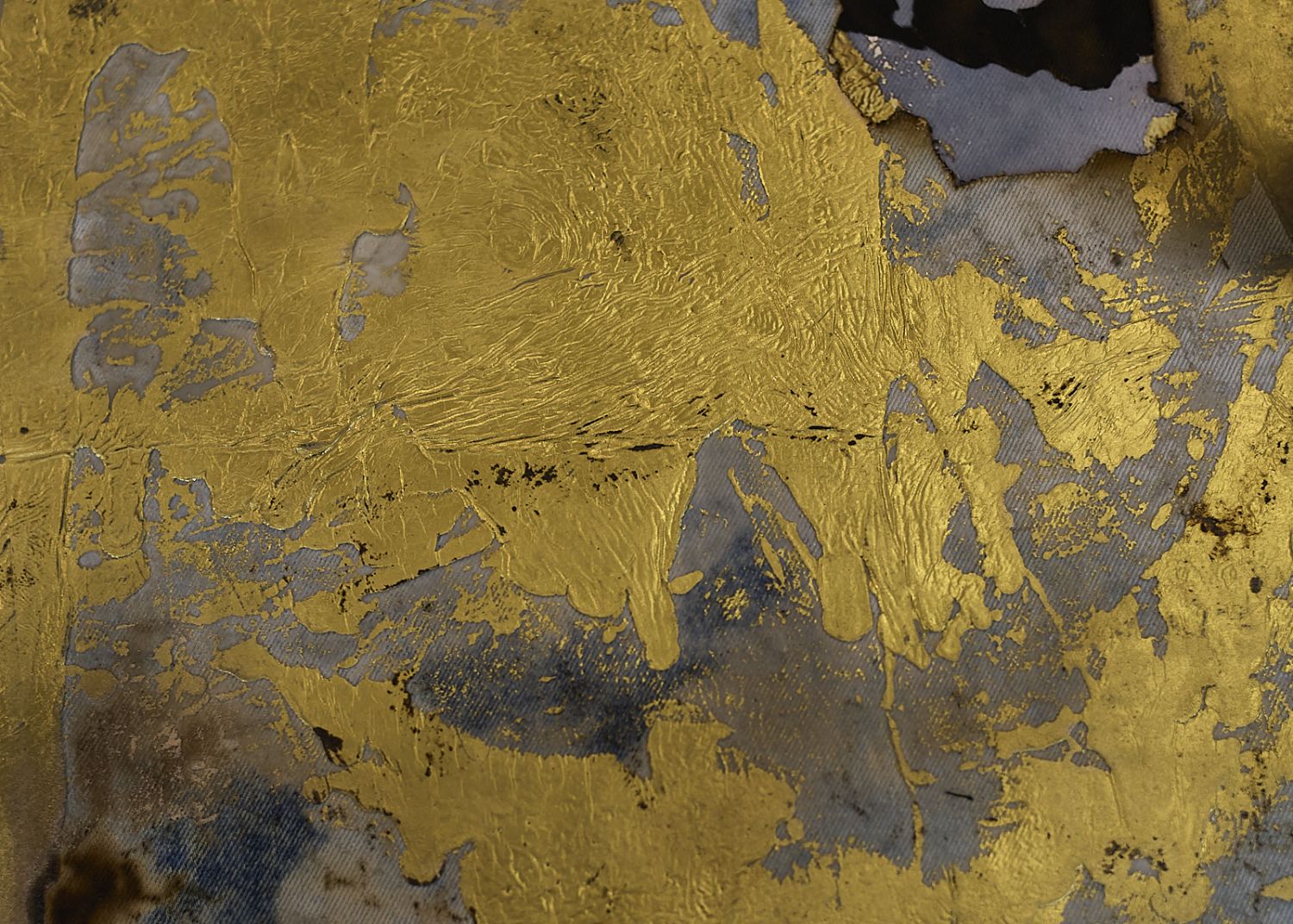 Paint on bleached and burned denim, part of Arunanondchai's fire painting series (Photo: Tom Hoops)