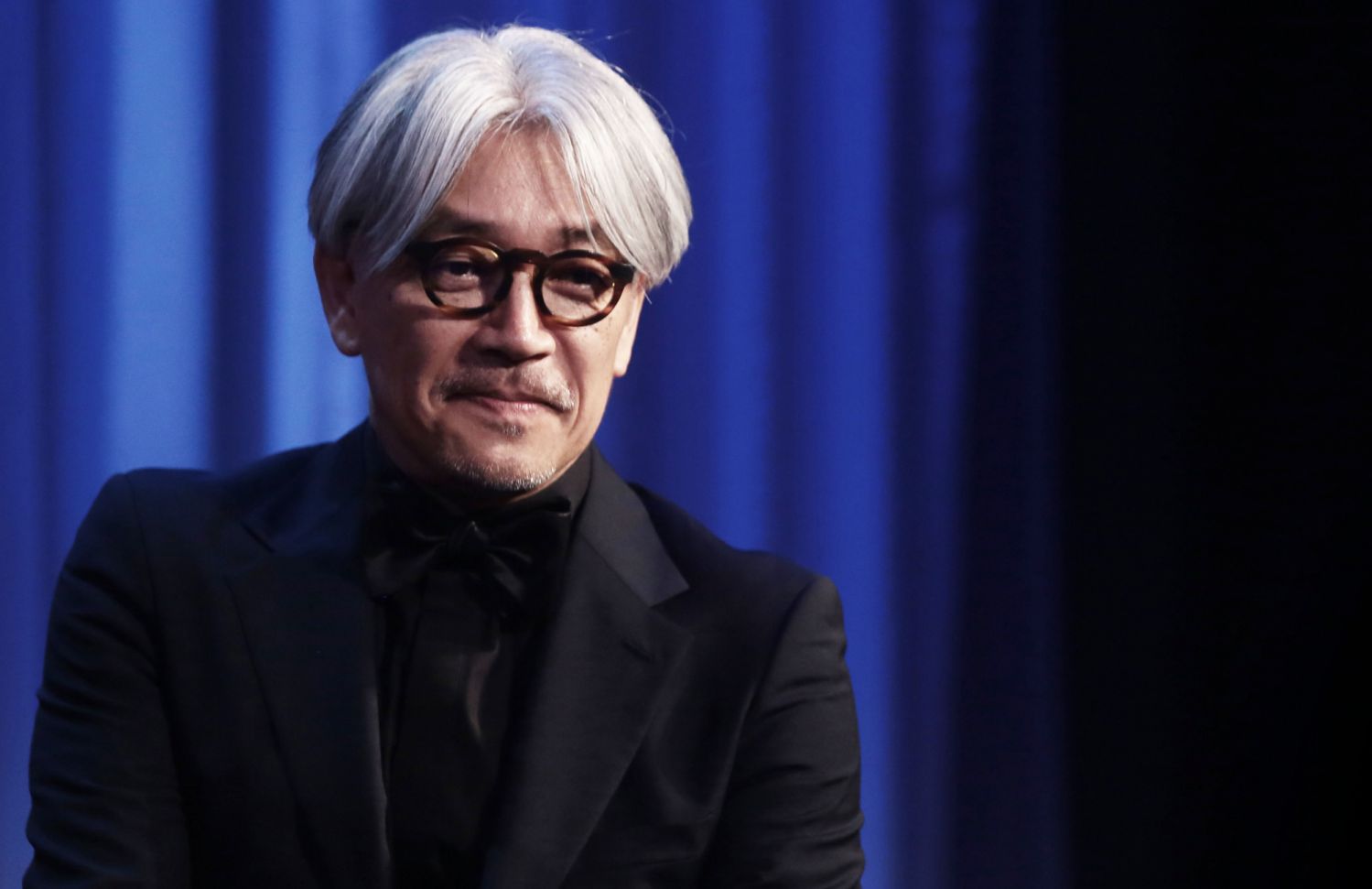 Ryuichi Sakamoto attends the awards ceremony of the 70th International Venice Film Festival. (Photo by Alessandra Benedetti/Corbis via Getty Images)