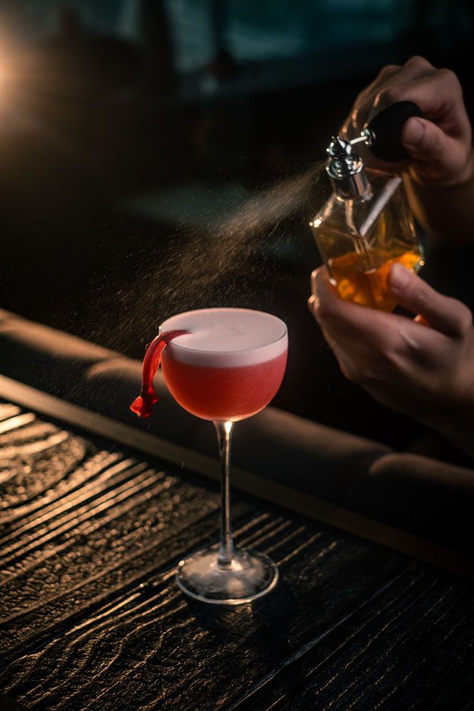 Songs of the Red Sea, a smoky-fruity cocktail made with Hesperides Island Gin, citrus, egg white and peat smoke