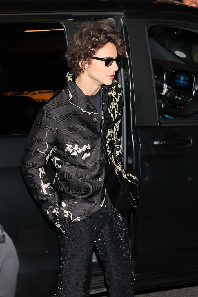PARIS, FRANCE - JANUARY 25: Timothée Chalamet is seen arriving at the Jean-Paul Gaultier show during Paris Fashion Week Haute Couture Spring Summer 2023 on January 25, 2023 in Paris, France. (Photo by Arnold Jerocki/Getty Images)