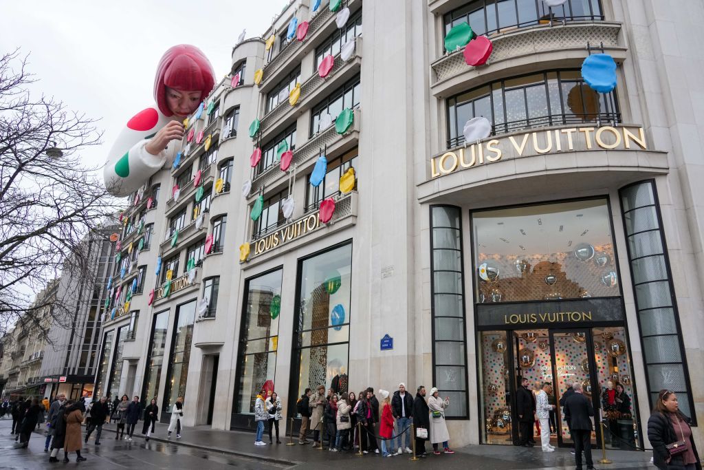 PARIS, FRANCE - JANUARY 12: A Yayoi Kusama sculpture is displayed on the top of the Louis Vuitton's Champs Elysees store, on January 12, 2023 in Paris, France. This Year the French Fashion house has launch a second collaboration with Yayoi Kusama.The first one was in 2012. The Yayoi Kusama x Louis Vuitton collection are now available in all Louis Vuitton's Stores Worldwide. (Photo by Edward Berthelot/Getty Images)