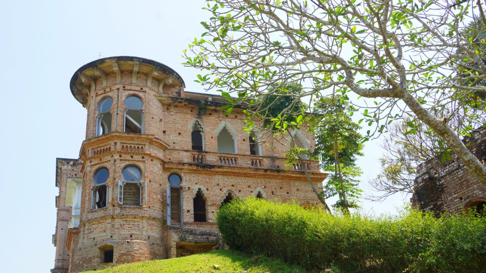 Exterior of unfinished abandoned mansion in Perak, Malaysia