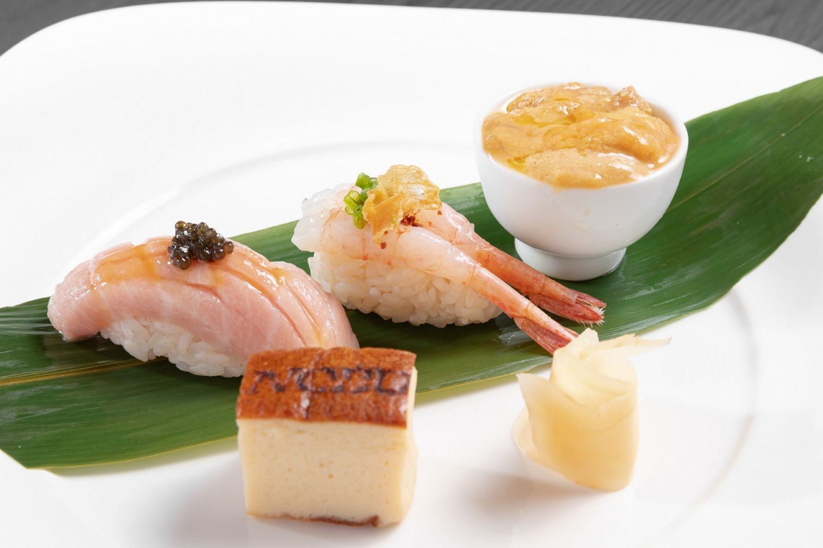 Nobu seasonal assorted sushi of toro, uni, and ama ebi