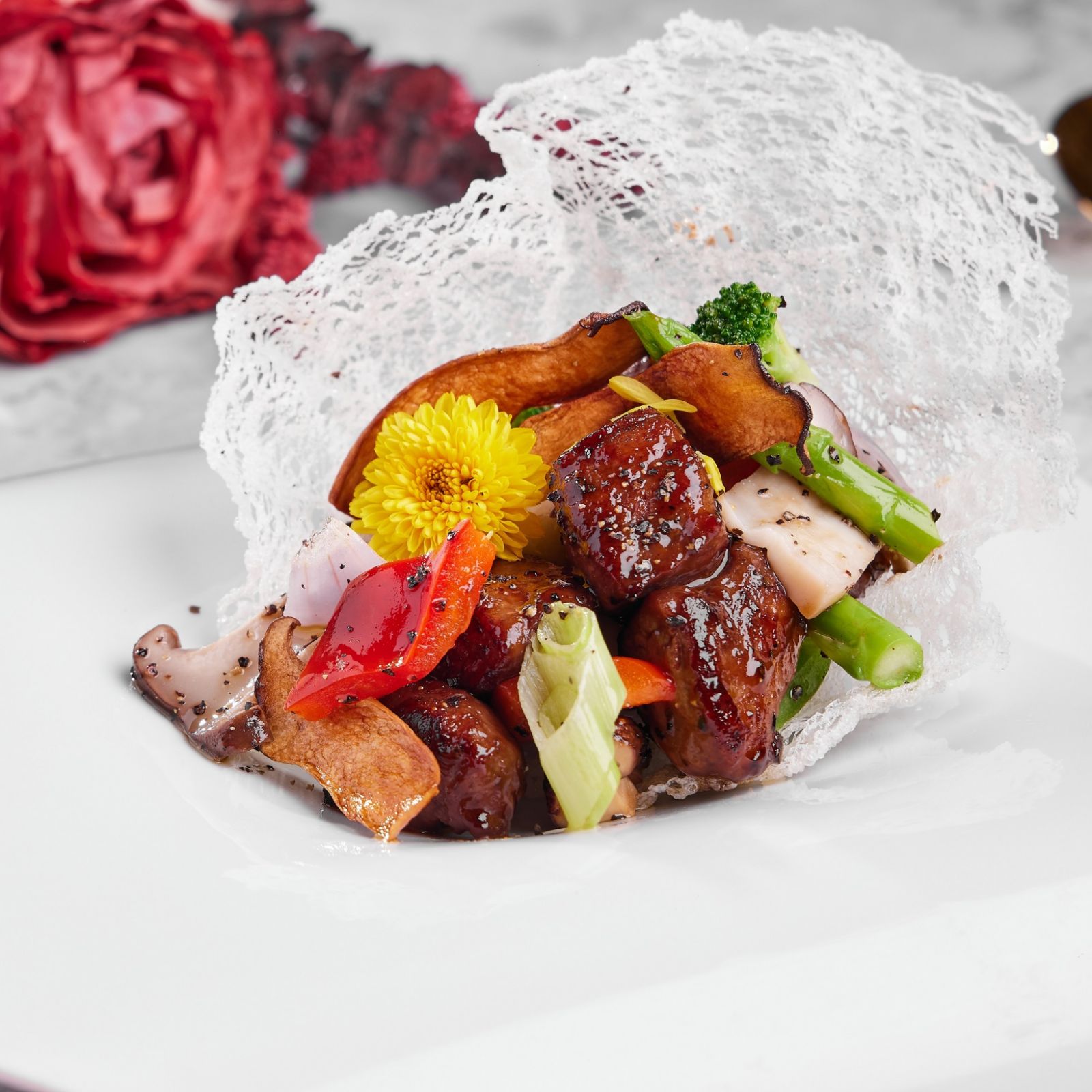 Crystal Dragon's wok-fried beef tenderloin with Sichuan pepper and king mushroom with sauteed mixed vegetables