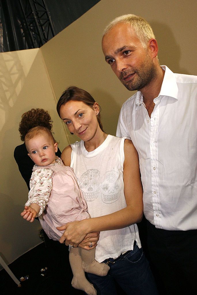 PARIS - OCTOBER 8: Phoebe Philo with her daugther Maya and her husband are seen backstage during the Chloe show as part of Paris Fashion Week (Pret-a-Porter) Spring/Summer 2006 on October 8, 2005 in Paris, France. (Photo by Michel Dufour/WireImage)