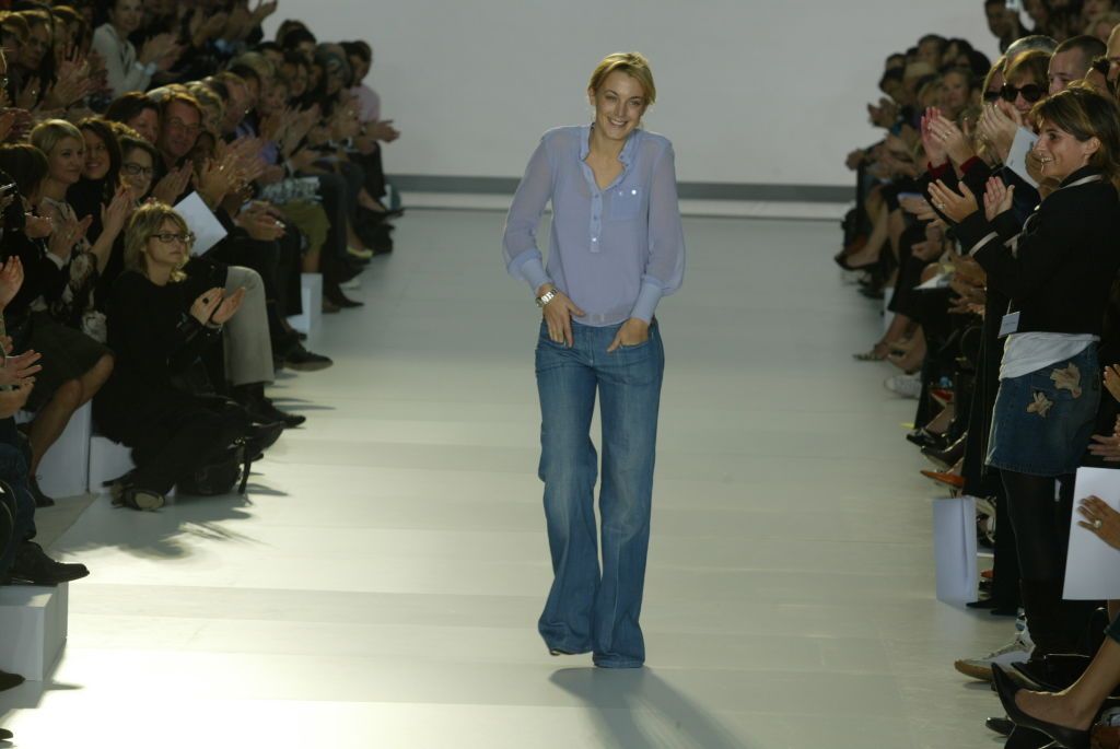 The designer Phoebe Philo walks down the runway at the Spring 2004 Chloe show in Paris. (Photo by Giovanni Giannoni/WWD/Penske Media via Getty Images)
