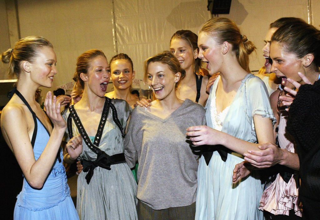 PARIS - MARCH 6: British designer Phoebe Philo (C) poses with the models at the Chloe Ready-To-Wear Fall-Winter 2004-2005 fashion collection, March 6, 2004 in Paris, France. (Photo by Michel Dufour/WireImage)
