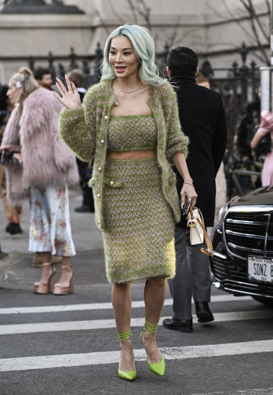 NEW YORK, NEW YORK - FEBRUARY 10: Tina Leung is seen wearing a green Rodarte outfit, lime green heels and cream bag outside the Rodarte show during New York Fashion Week F/W 2023 on February 10, 2023 in New York City. (Photo by Daniel Zuchnik/Getty Images)