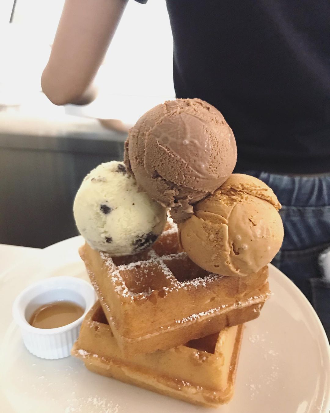 You can customise your ice cream orders to include a stack of waffles with your ice cream (Photo: @creameal/Instagram)