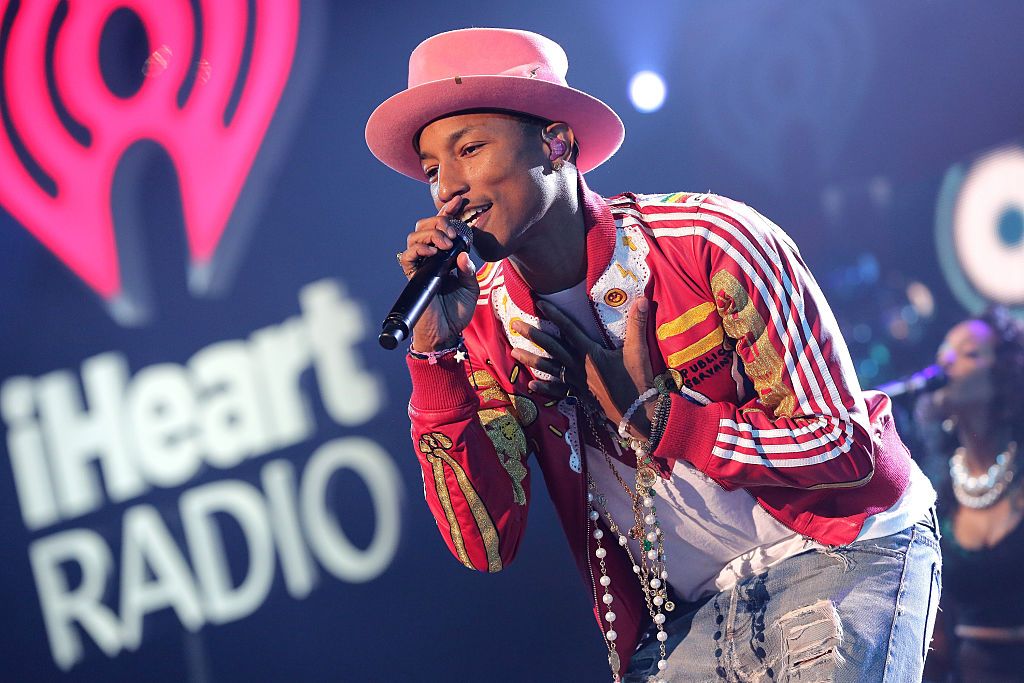 TAMPA, FL - DECEMBER 22:  Pharrell Williams performs onstage during 93.3 FLZÂs Jingle Ball 2014 at Amalie Arena on December 22, 2014 in Tampa, Florida.  (Photo by Alexander Tamargo/Getty Images for iHeartMedia)