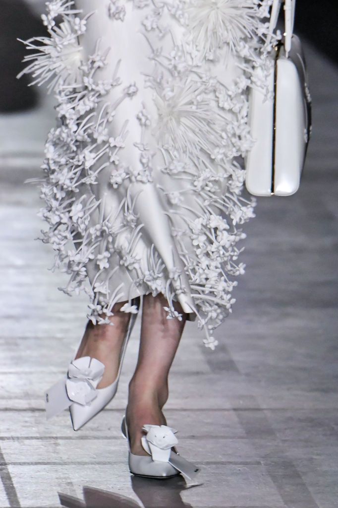 MILAN, ITALY - FEBRUARY 23: A model walks the runway during the Prada Ready to Wear Fall/Winter 2023-2024 fashion show as part of the Milan Fashion Week on February 23, 2023 in Milan, Italy. (Photo by Victor VIRGILE/Gamma-Rapho via Getty Images)