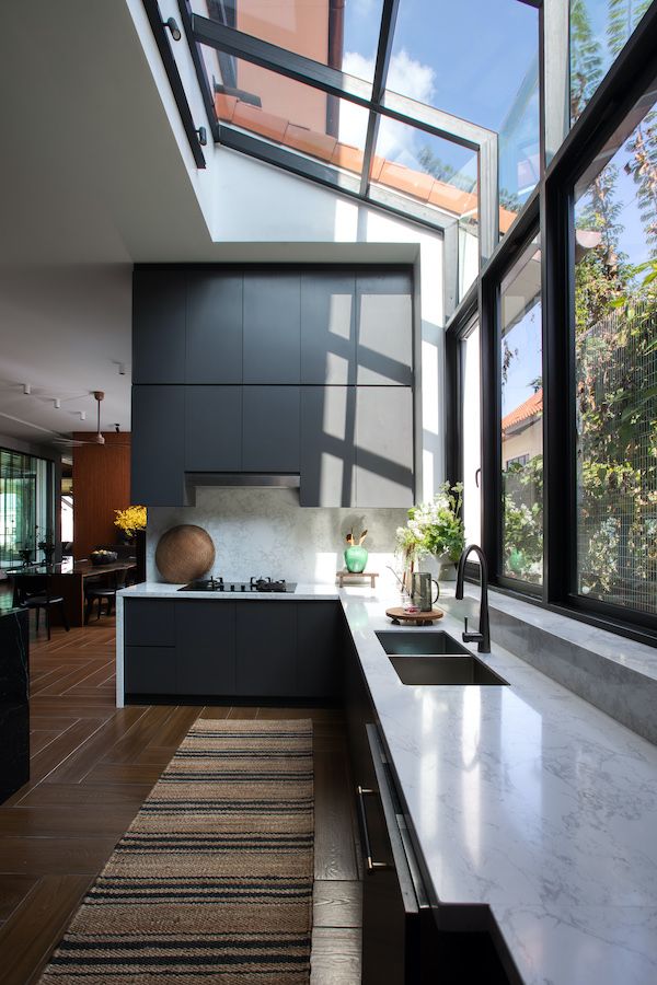 Wide windows invite views in to the kitchen