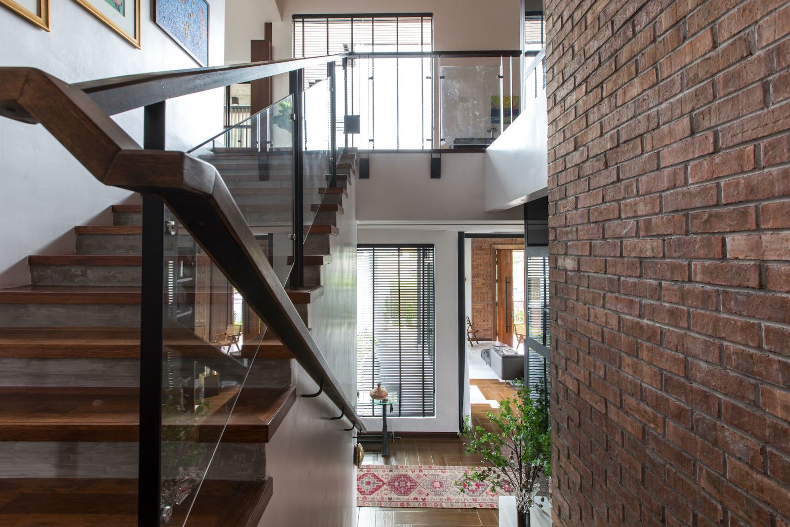 Crafted touches like the wooden bannister are found throughout the house