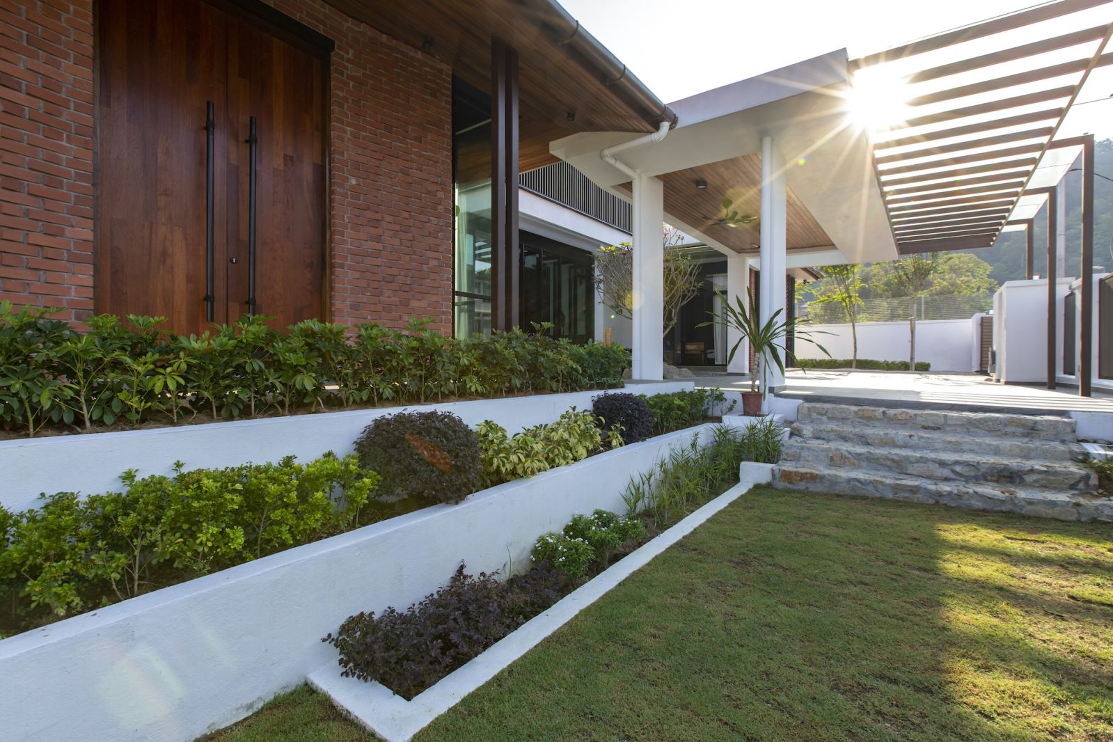 Generous planting softens the outdoor area