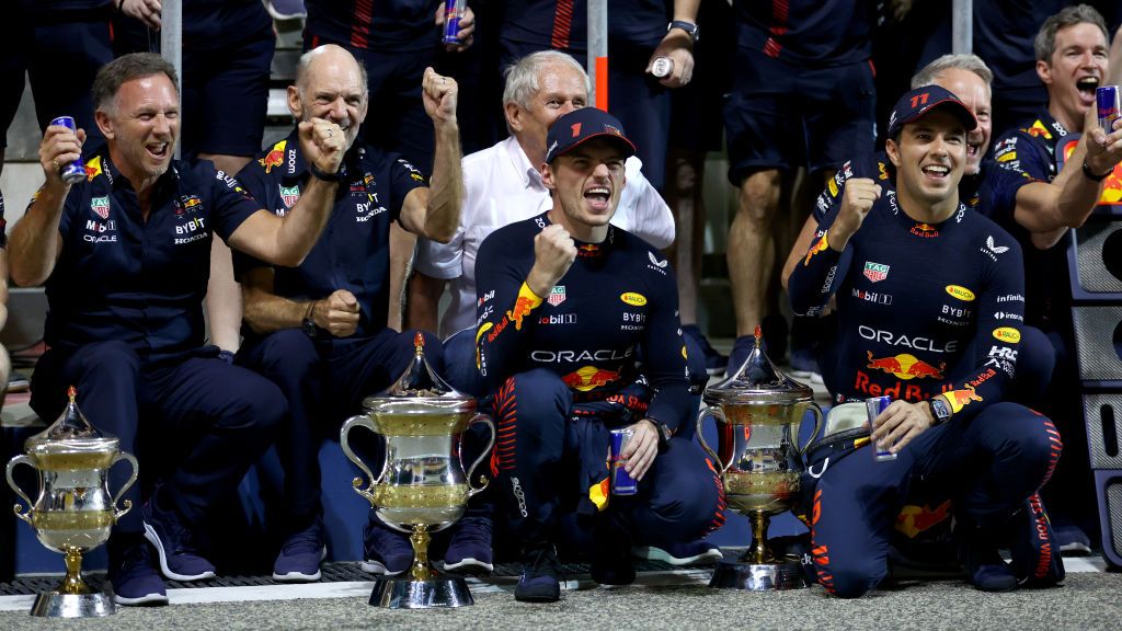 BAHRAIN, BAHRAIN - MARCH 05: Race winner Max Verstappen of the Netherlands and Oracle Red Bull Racing and Second placed Sergio Perez of Mexico and Oracle Red Bull Racing celebrate with their team after the F1 Grand Prix of Bahrain at Bahrain International Circuit on March 05, 2023 in Bahrain, Bahrain. (Photo by Bryn Lennon - Formula 1/Formula 1 via Getty Images)