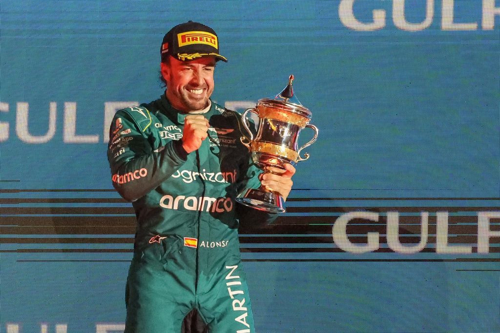 Fernando Alonso (SPA) of Aston Martin AMR23 is celebrating on the podium of the Formula 1 Gulf Air Bahrain Grand Prix on March 5, 2023 in Sakhir, Bahrain (Photo by Alex Galli/LiveMedia/NurPhoto via Getty Images).