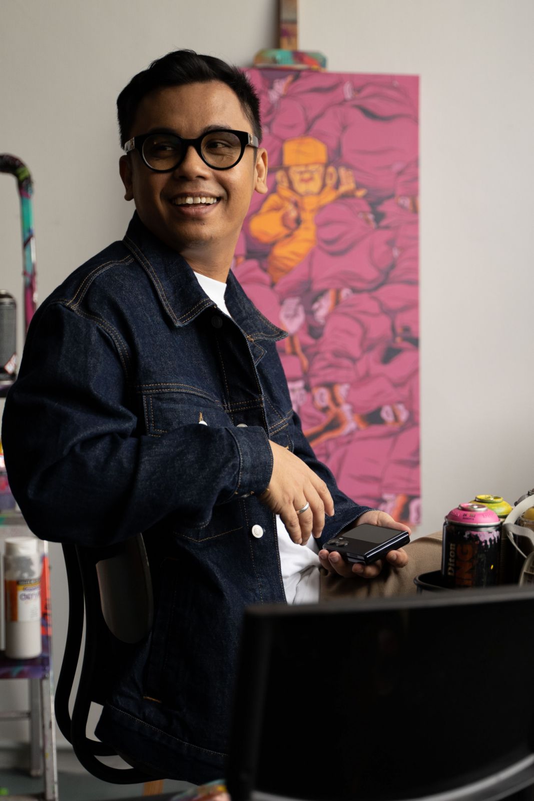 Grafitti artist Abdul Hafiz ‘Katun’ Abdul Rahman finds joy in bringing colourful characters to life (Photo: Daniel Adams)