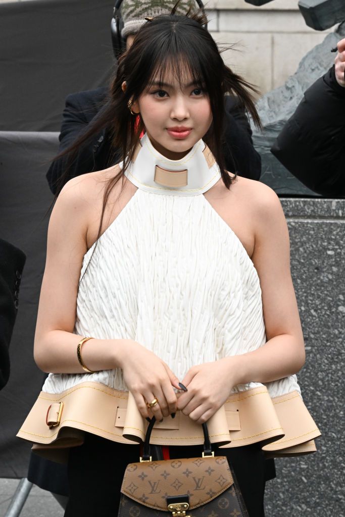 PARIS, FRANCE - MARCH 06:  Hyein of NewJeans  attends the Louis Vuitton Womenswear Fall Winter 2023-2024 show as part of Paris Fashion Week on March 06, 2023 in Paris, France. (Photo by Stephane Cardinale - Corbis/Corbis via Getty Images)
