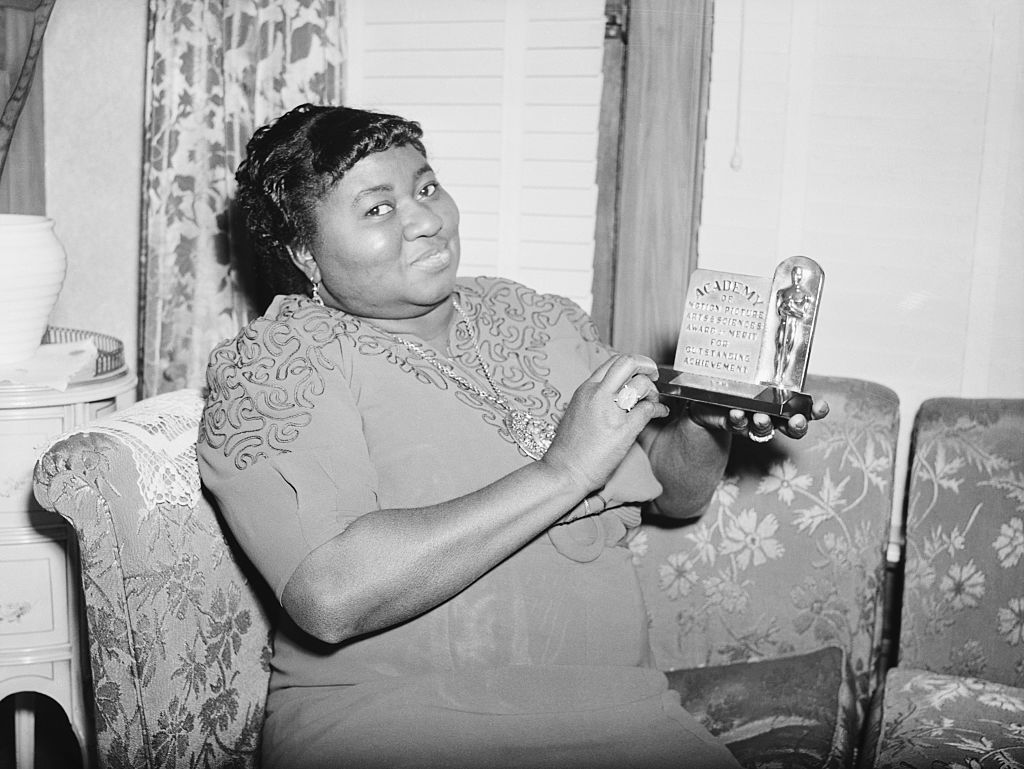 3/2/1940Actress Hattie McDaniel is shown with the statuette she received for her portrayal in "Gone With The Wind." The award was for Best Supporting Role by an Actress, and was made at the 12th annual Academy Awards ceremony. (Photo by Bettmann/Getty Images)