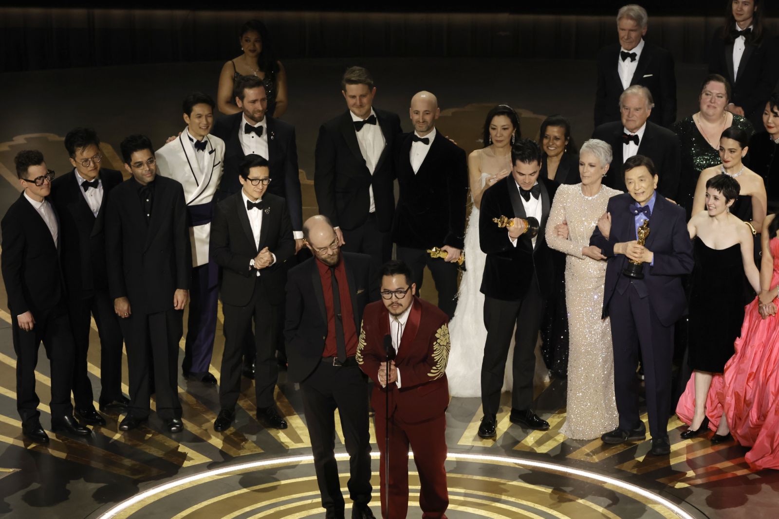 HOLLYWOOD, CALIFORNIA - MARCH 12: (front L-R) Daniel Scheinert and Daniel Kwan accept the Best Picture award for "Everything Everywhere All at Once" along with cast and crew onstage during the 95th Annual Academy Awards at Dolby Theatre on March 12, 2023 in Hollywood, California. (Photo by Kevin Winter/Getty Images)