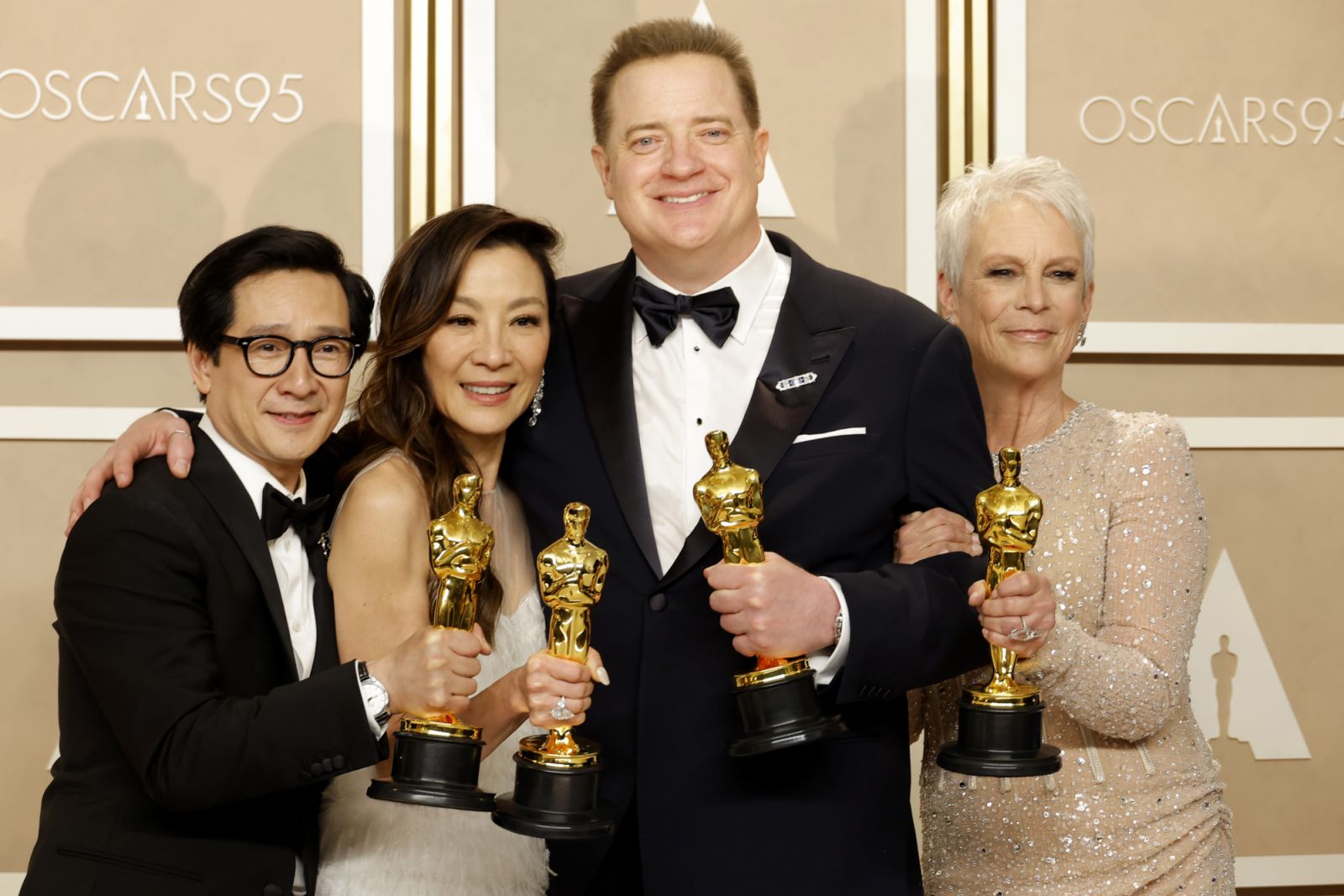 HOLLYWOOD, CALIFORNIA - MARCH 12: Brendan Fraser (second from R), winner of the Best Actor in a Leading Role award for "The Whale," and (L-R) Ke Huy Quan, winner of the Best Actor In A Supporting Role award, Michelle Yeoh, winner of the Best Actress in a Leading Role award and Jamie Lee Curtis, winner of the Best Supporting Actress award for "Everything Everywhere All at Once," pose in the press room during the 95th Annual Academy Awards on March 12, 2023 in Hollywood, California. (Photo by Mike Coppola/Get