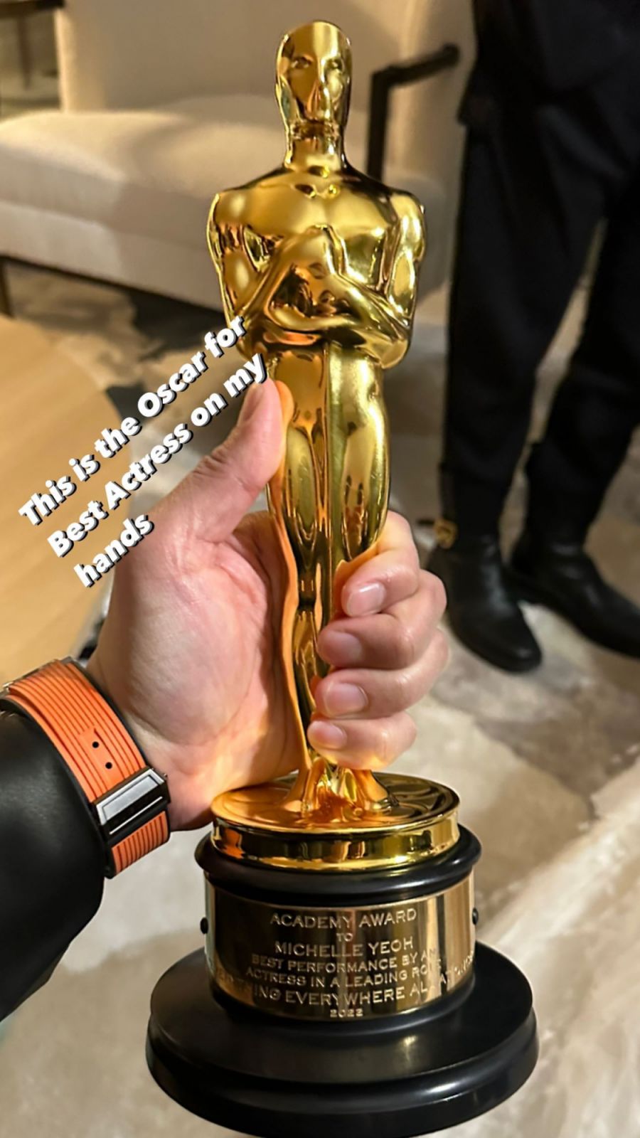 Dato Joey Yap holding Michelle Yeoh's Best Actress Oscar