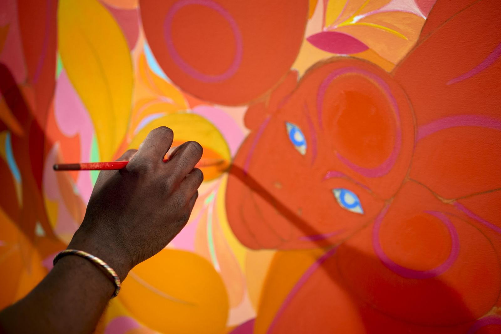 Details from the artist's intricate, vivid paintings (Photo: On White Wall Studio)