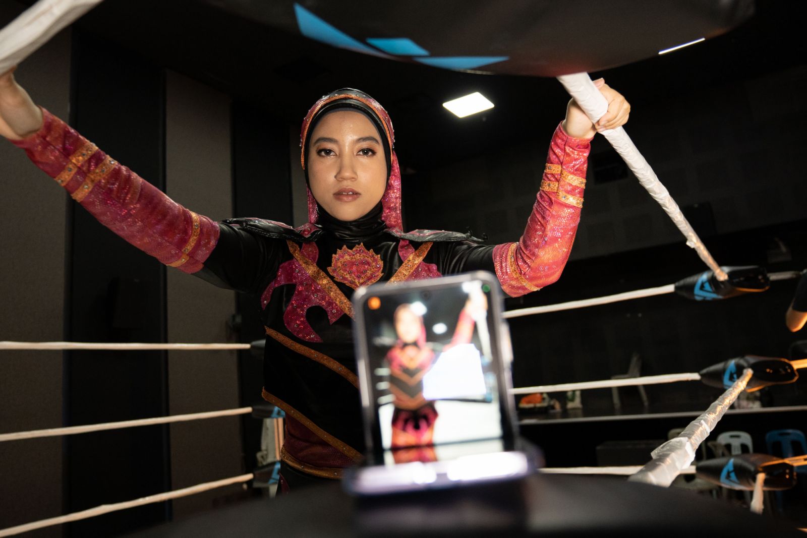 Nor Diana is known for her daring aerial manoeuvres, charm and agility, which have helped her win over wrestling fans. (Photo: Oscar Lee Hao Xuan)