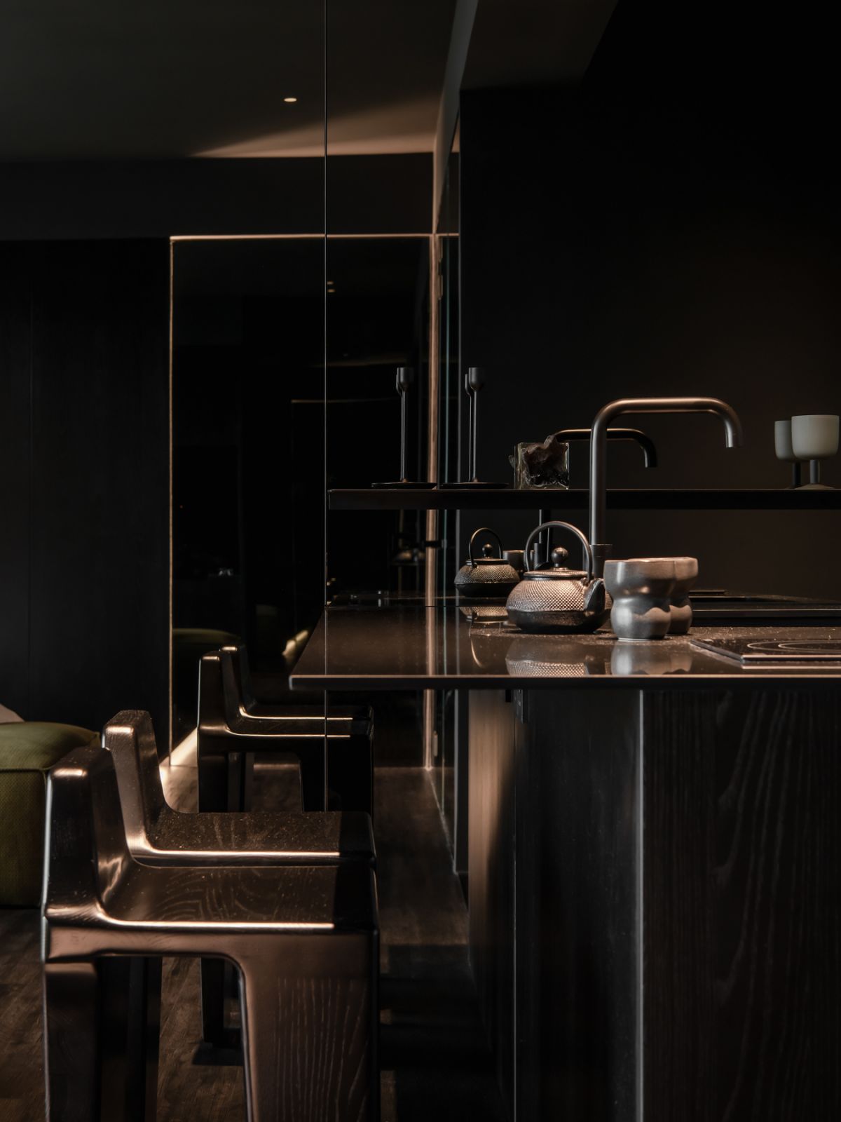 Sleek bar stools match the finishings