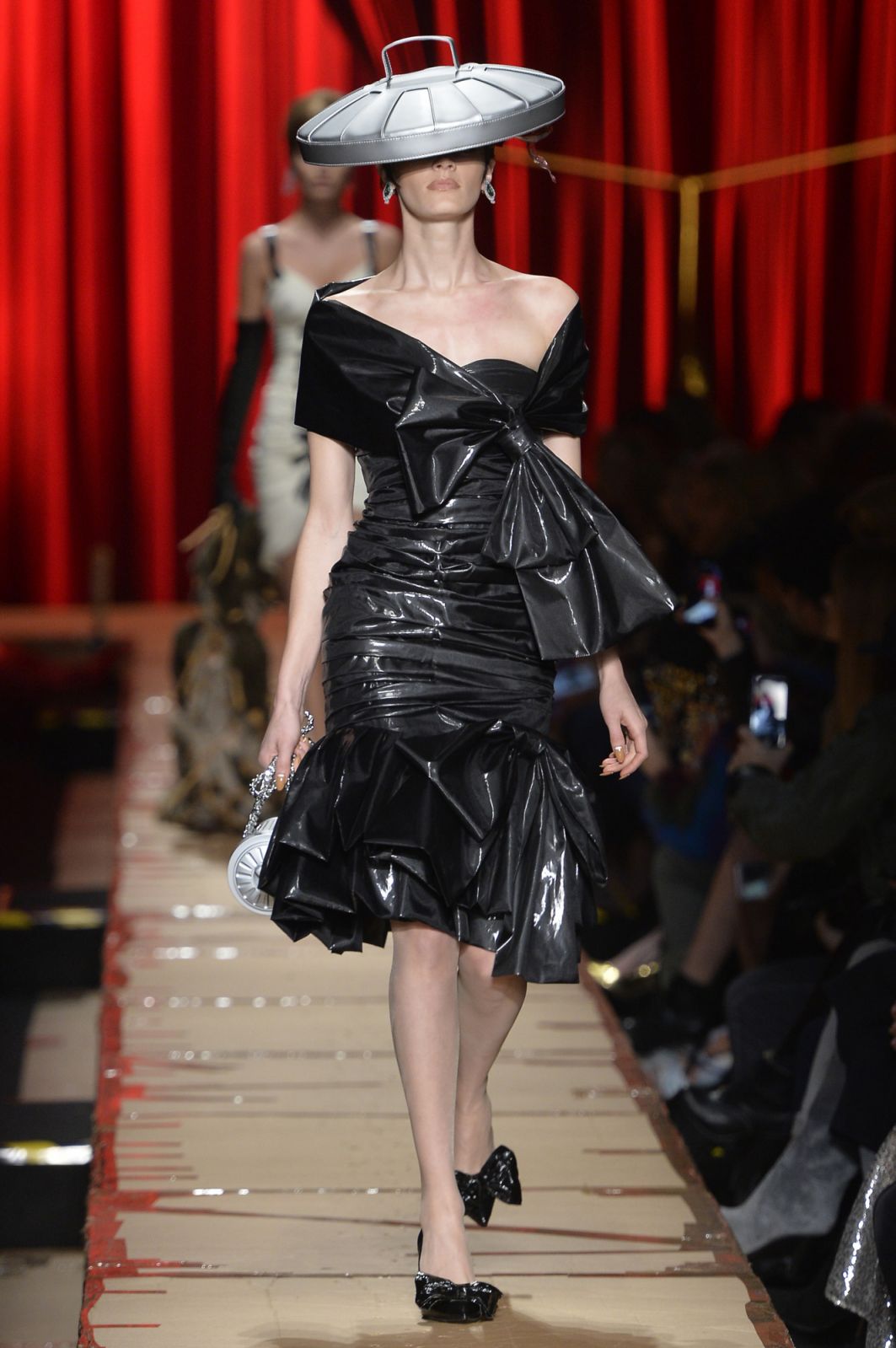MILAN, ITALY - FEBRUARY 23:  A model walks the runway at the Moschino Autumn Winter 2017 fashion show during Milan Fashion Week on February 23, 2017 in Milan, Italy.  (Photo by Catwalking/Getty Images)