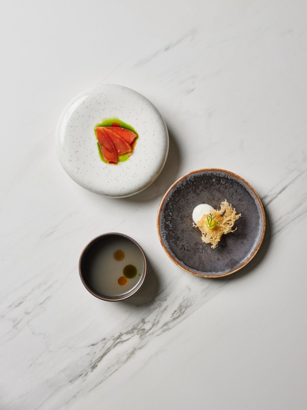 Helm by Josh Boutwood Makati City fjord salmon, juniper _ soy, fish and chips, mussel dashi