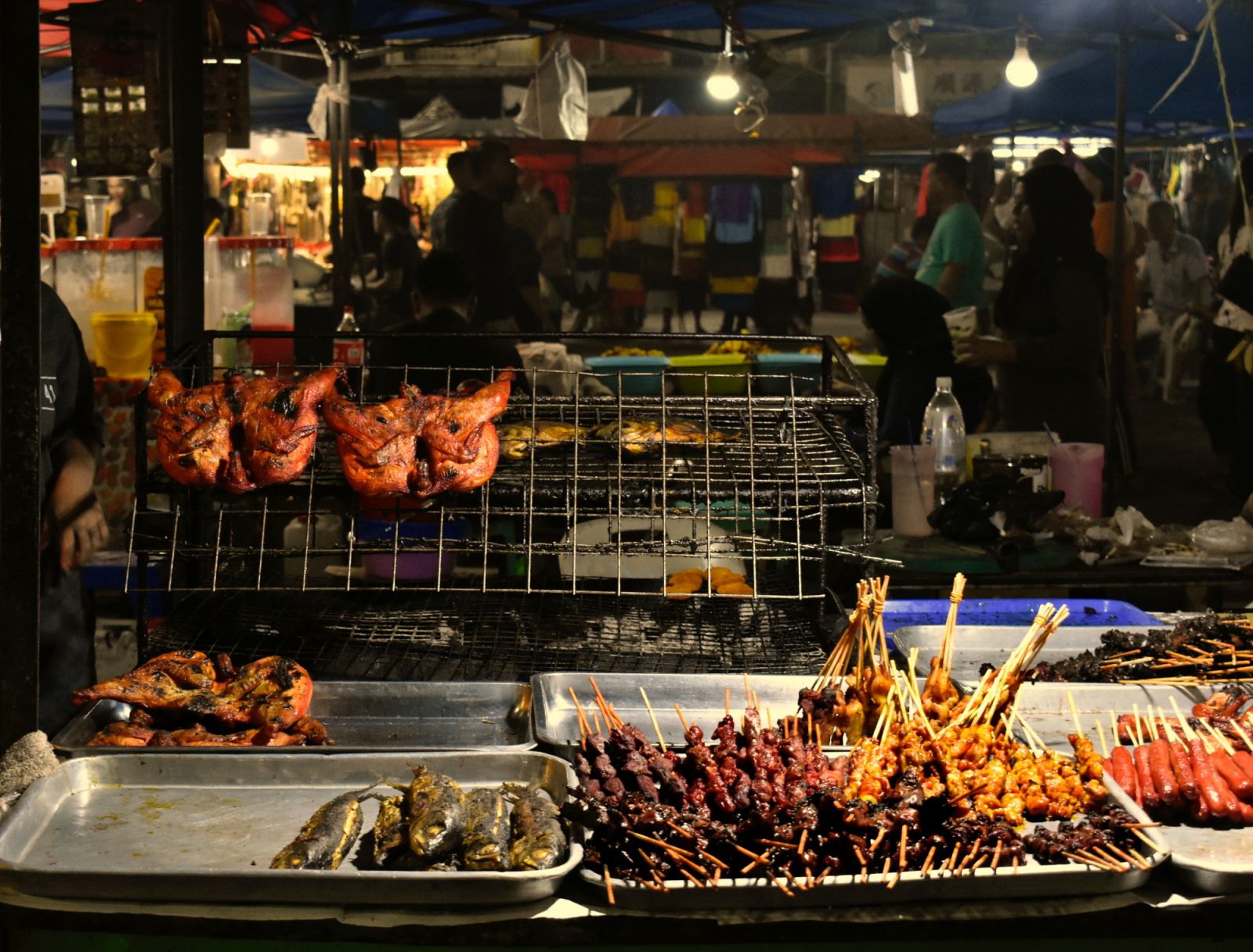Classic charcoal grilled eats at a bazaar (Photo: Unsplash / Jordan Ling)