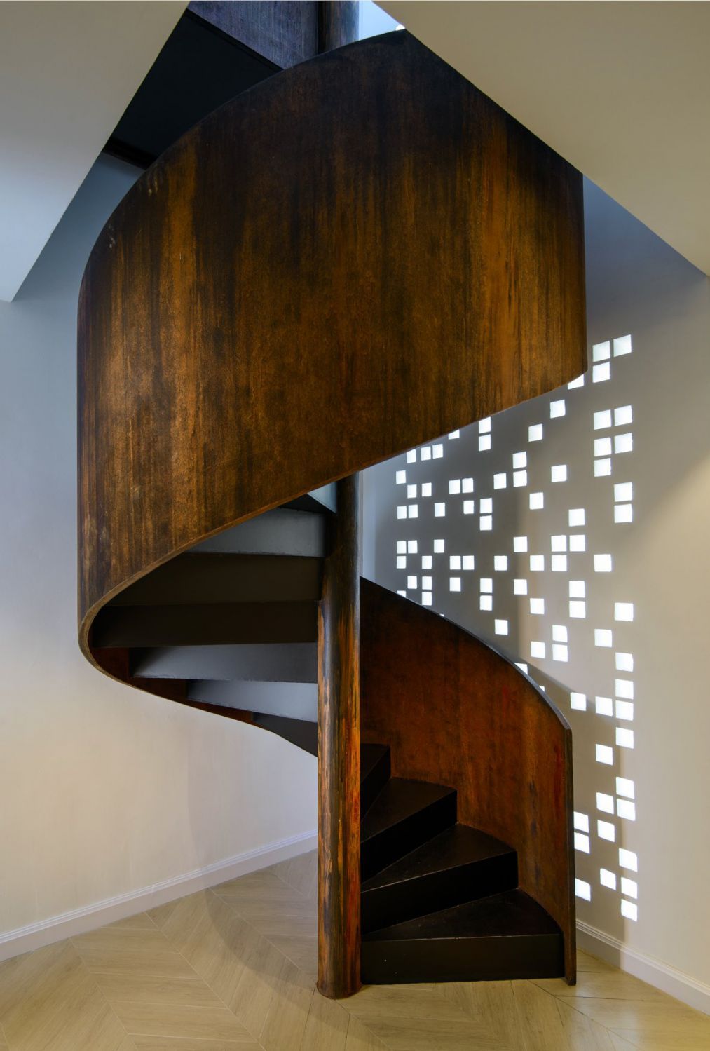 The spiral staircase offers another way to access the upstairs