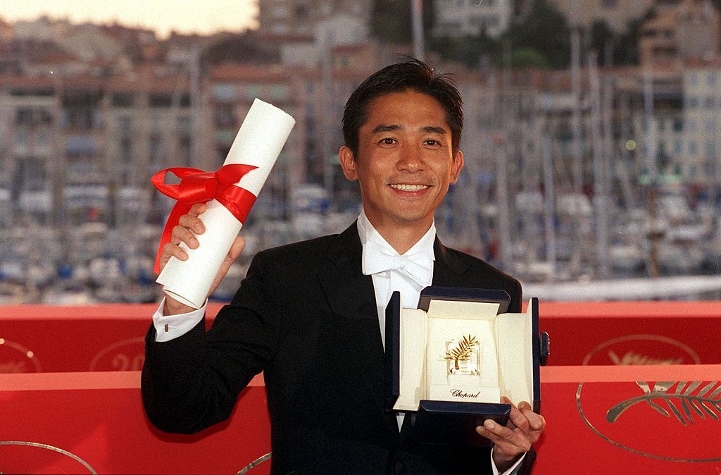 FRANCE - MAY 21: Cannes film festival : photo call of the winners In Cannes, France On May 21, 2000-Tony Leung Chiu-Wai best actor for "In the mood for love". (Photo by Pool BENAINOUS/DUCLOS/Gamma-Rapho via Getty Images)