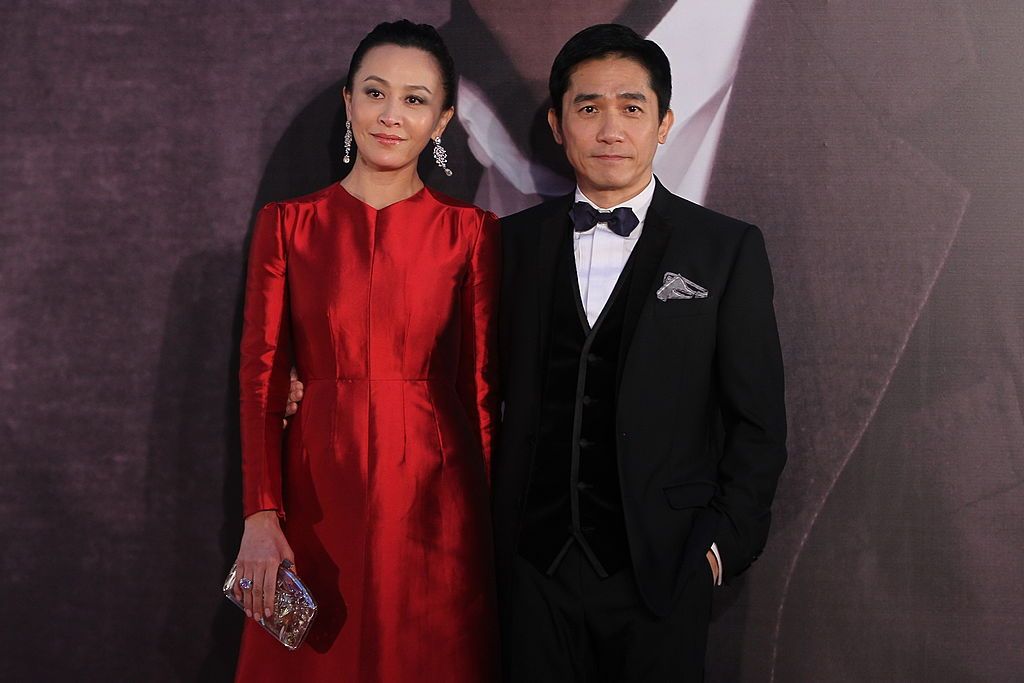 HONG KONG - APRIL 13: (CHINA OUT) Carina Lau and Tony Leung Chiu Wai arrive at the red carpet of the 32nd Hong Kong Film Awards on April 13, 2013 in Hong Kong. (Photo by Visual China Group via Getty Images/Visual China Group via Getty Images)