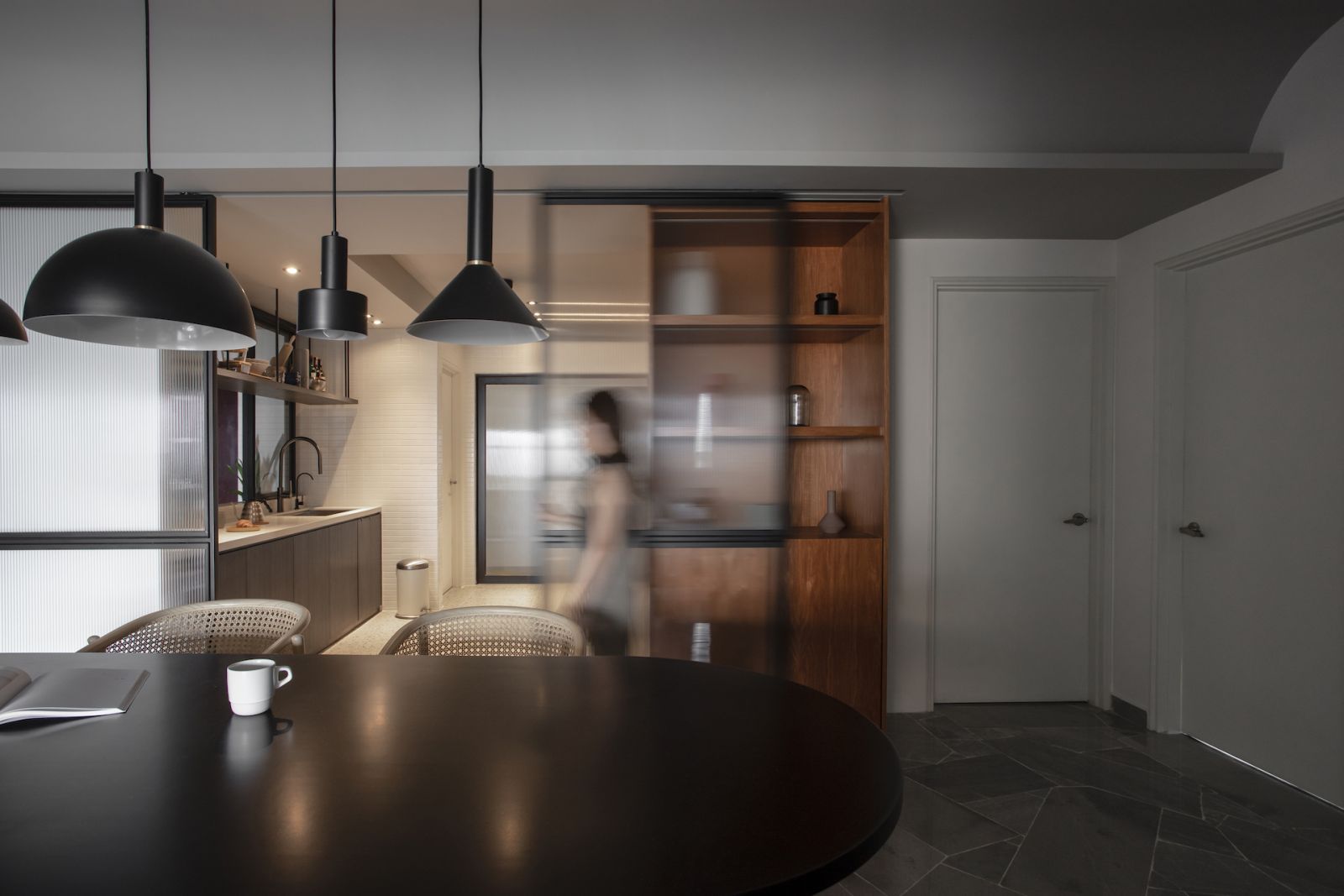 Sliding doors separate the spaces