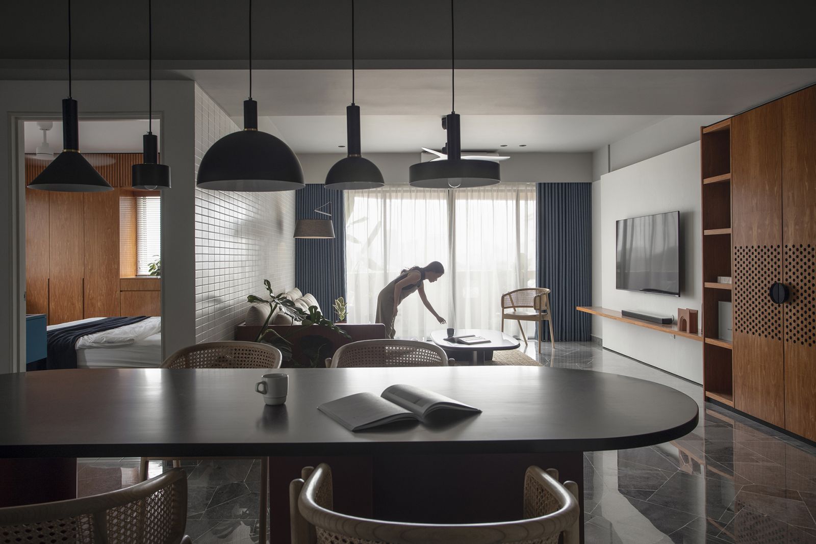 The oval shaped dining table was custom made