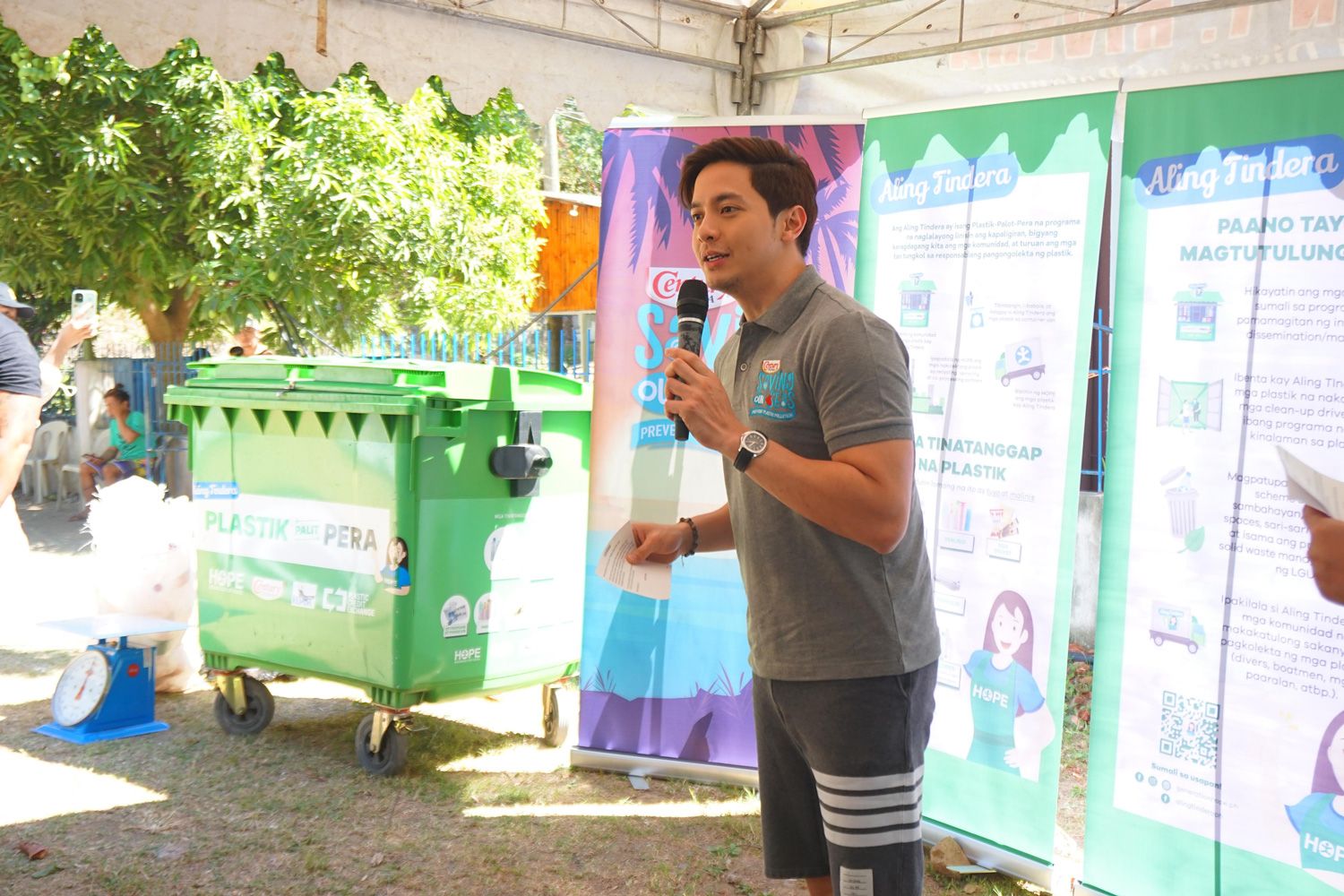 Century Tuna Ambassador Alden Richards talks to the community of Brgy. Ligaya, Mabini, Batangas