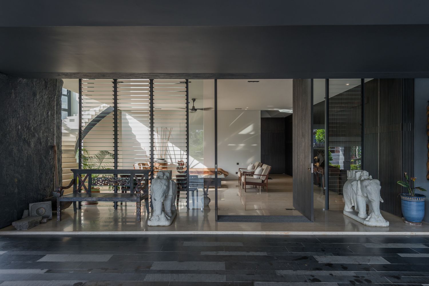 A serene tableau greets guests on the ground floor where the cars are parked (Photo: Lin Ho)