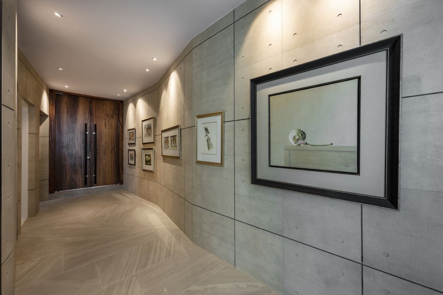 Simple finishes were favoured and complement the owners' art collection (Photo: Lin Ho)
