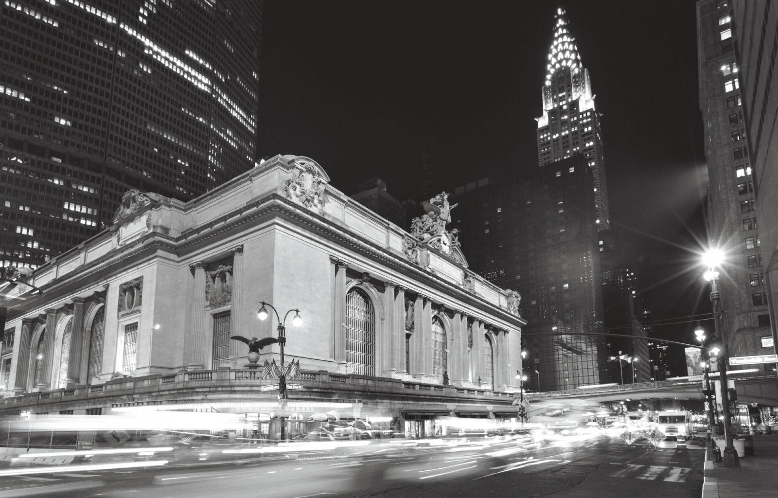 Busy traffic and Grand Central Station at night, New York, USA