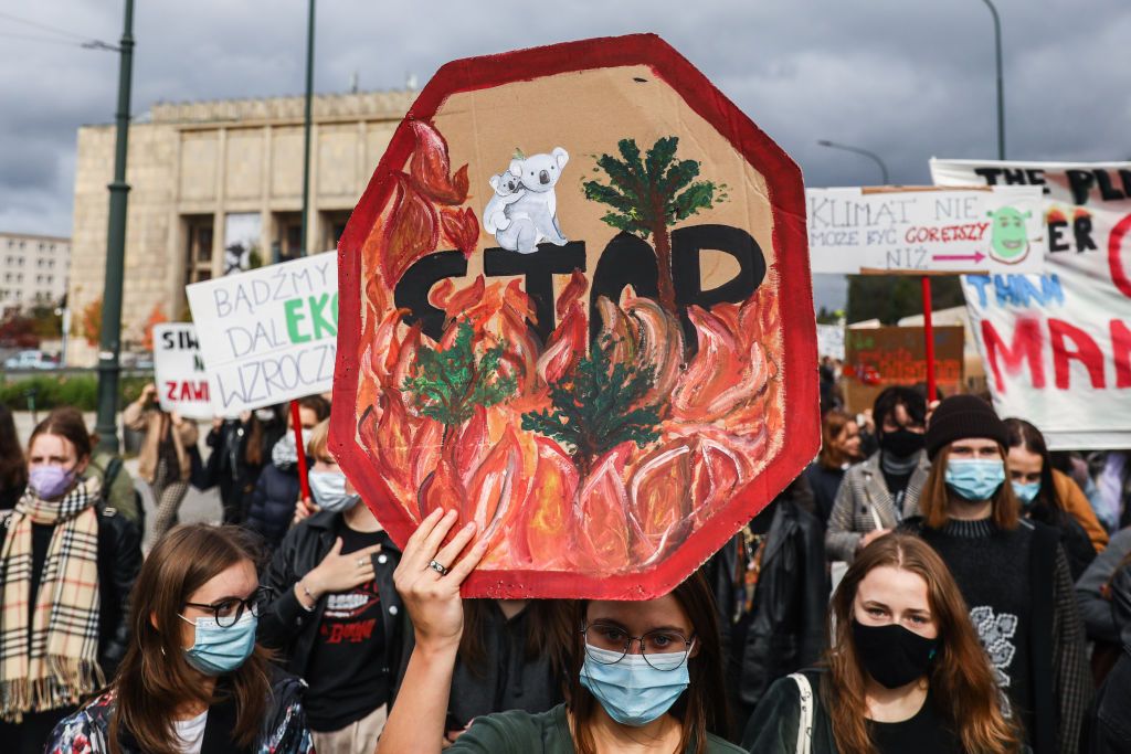 Students and supporters attend Climate Strike protest organized by Fridays for Future movement also known as Youth Strike for Climate. Krakow, Poland on September 24, 2021. Participants, who wore face masks due to the coronavirus pandemic, demonstrated demanding action from political leaders to prevent climate change and for the fossil fuel industry to transition to renewable energy. (Photo by Beata Zawrzel/NurPhoto via Getty Images)