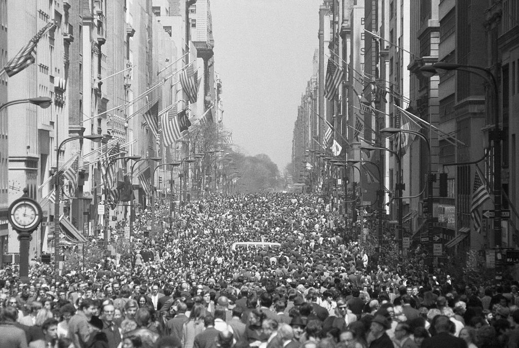 (Original Caption) 4/22/1970-New York, NY- Fifth Avenue, reminiscent of some European promenade, is filled with thousands of people just after the fashionable street was closed to motor traffic at noon on Earth Day. Conceived as a national teach-in, patterned after the Vietnam teach-ins held on hundreds of campuses in the Spring of 1965, Earth Day is a nation-wide demonstration of concern for the planet and all forms of life--not only man--who live on it.