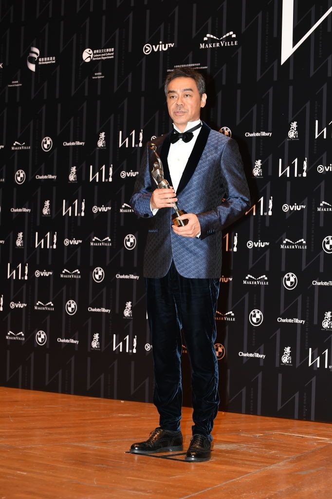HONG KONG, CHINA - APRIL 16: Actor Sean Lau Ching-wan poses with his best actor trophy at backstage during the 41st Hong Kong Film Awards at Hong Kong Cultural Centre on April 16, 2023 in Hong Kong, China. (Photo by VCG/VCG via Getty Images)