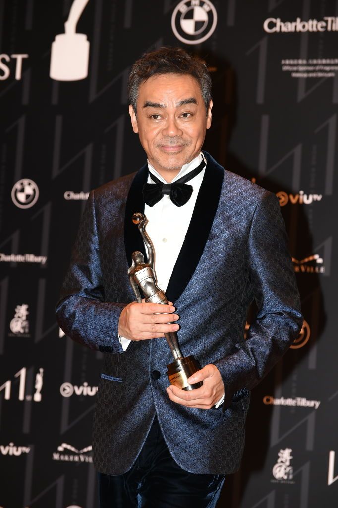 HONG KONG, CHINA - APRIL 16: Actor Sean Lau Ching-wan poses with his best actor trophy at backstage during the 41st Hong Kong Film Awards at Hong Kong Cultural Centre on April 16, 2023 in Hong Kong, China. (Photo by VCG/VCG via Getty Images)