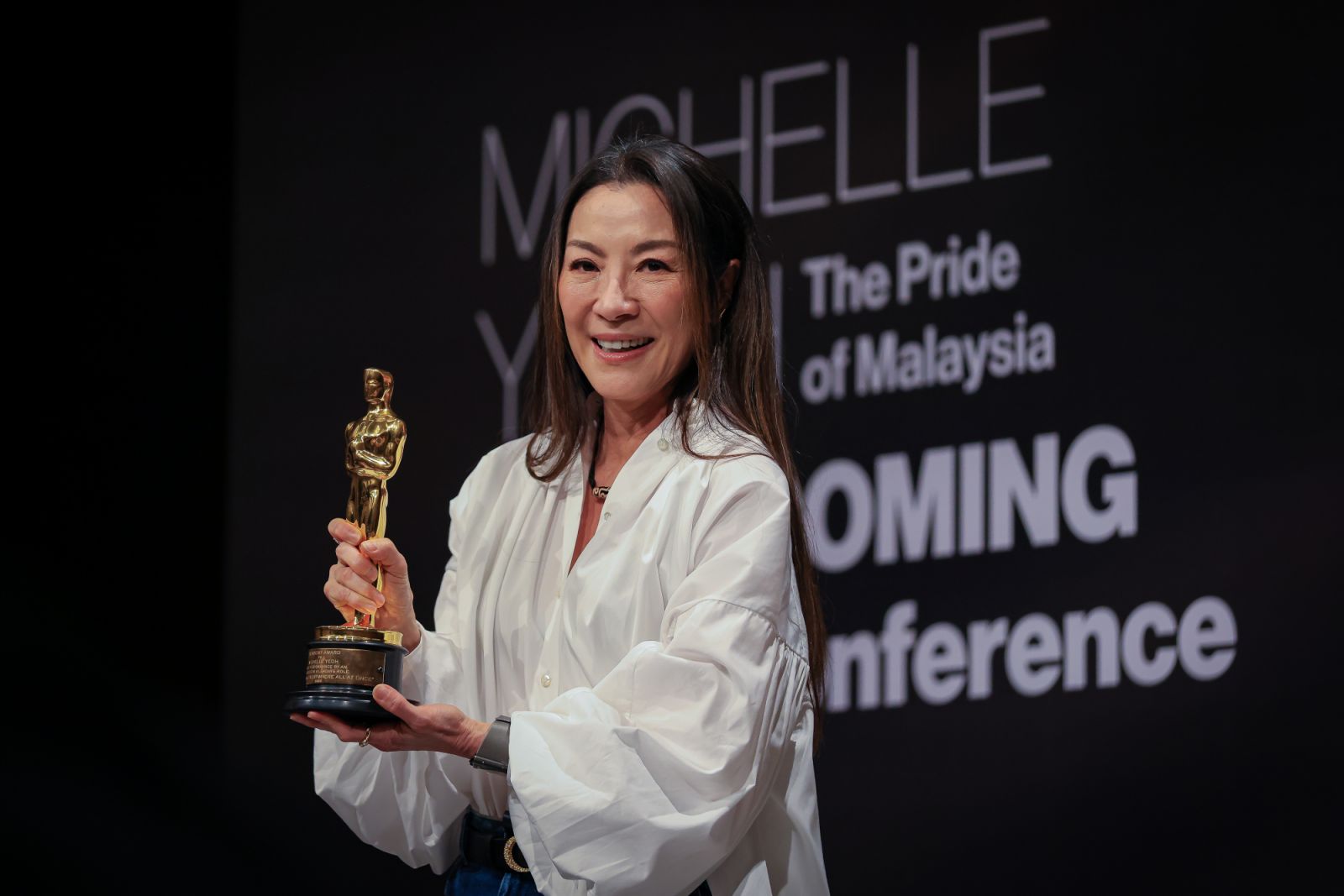 KUALA LUMPUR, MALAYSIA - APRIL 18: Michelle Yeoh holds her Oscar statuette as she pose for the media during a press conference ahead of her Homecoming Public Fan Meet and Greet at the Pavilion Hotel KL on April 18, 2023 in Kuala Lumpur, Malaysia. Michelle Yeoh won the Academy Award for Best Actress for her performance in "Everything Everywhere All at Once" at the 95th Academy Awards ceremony in Los Angeles, California in March. She is the first Asian woman to win an Academy Award for Best Actress. (Photo by