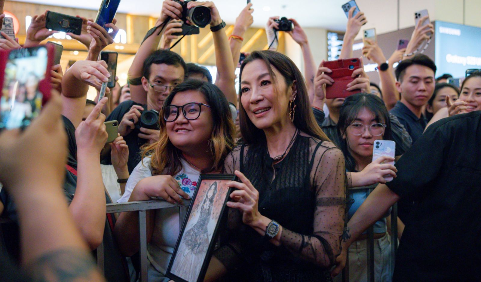 KUALA LUMPUR, MALAYSIA - APRIL 18: Malaysian actress Michelle Yeoh greets fans during a public appearance at the Pavilion KL Centre Court on April 18, 2023 in Kuala Lumpur, Malaysia. Michelle Yeoh was awarded the 2023 Oscar Award for Best Actress for her performance in "Everything Everywhere All at Once" at the 95th Academy Awards in Los Angeles in March. She is the first Asian woman in history to win the best actress Oscar. (Photo by Annice Lyn/Getty Images)