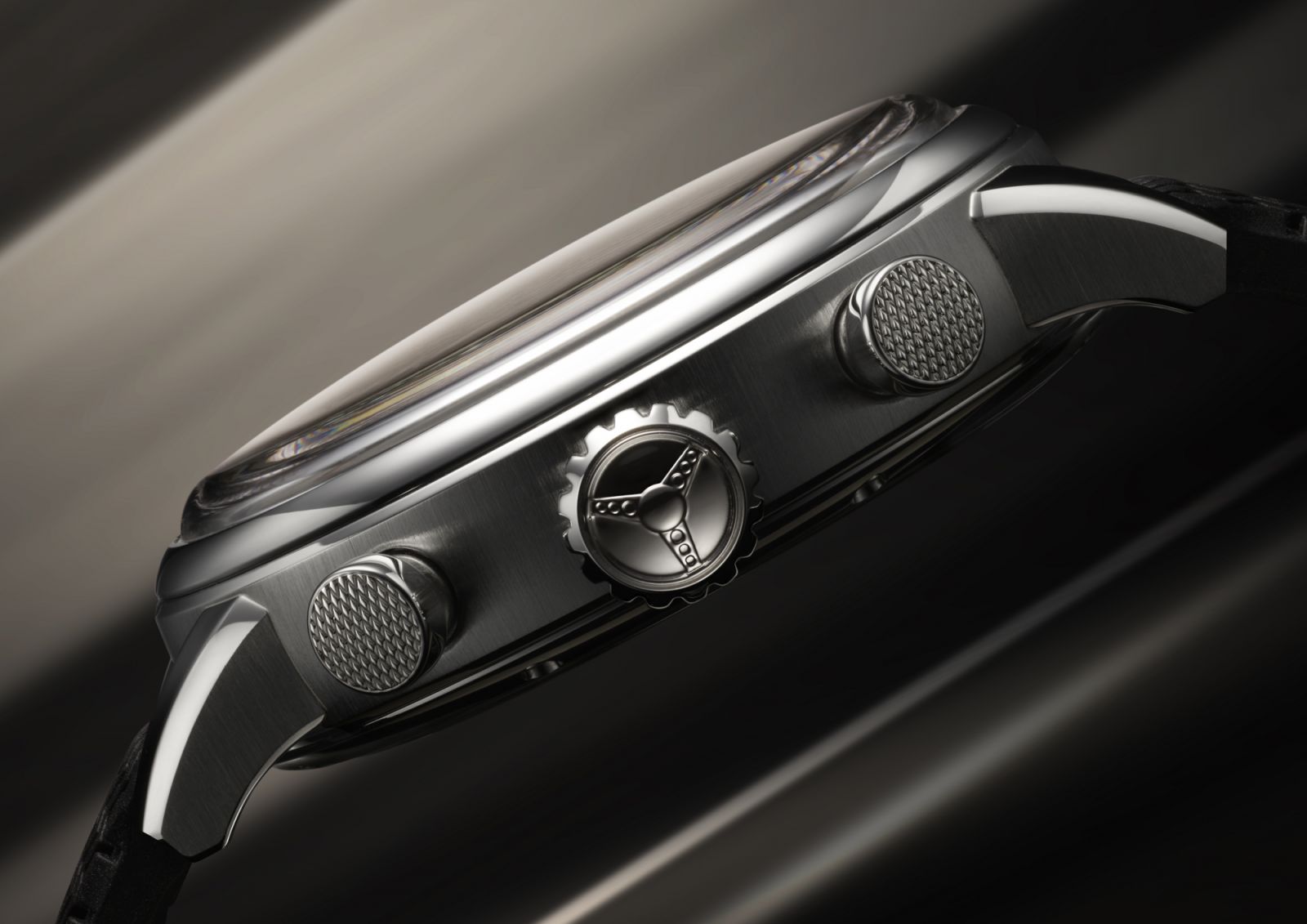 Racing motifs on the crown and pushers of the Mille Miglia Classic Chronograph in Lucent Steel
